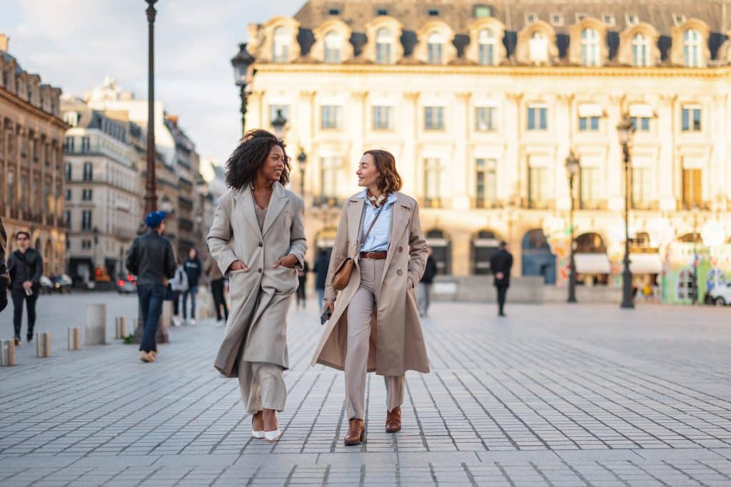 Teacher and student walking and talking in the streets of Paris